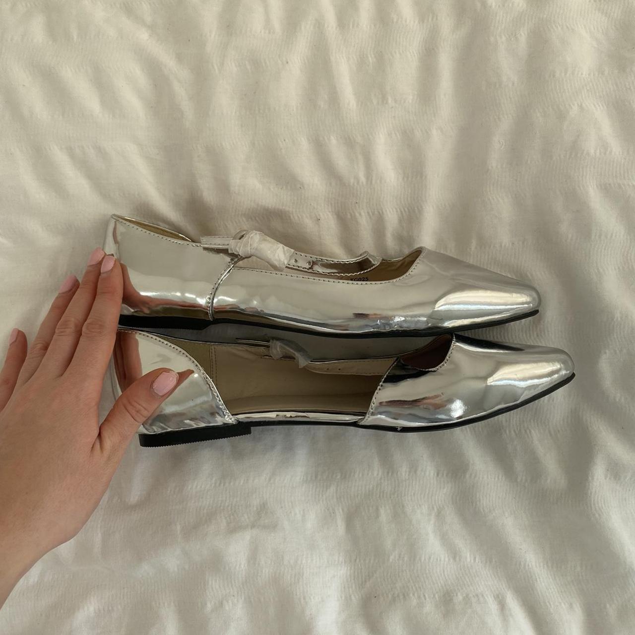 Cutest silver ballet pumps with asymmetric buckle... Depop