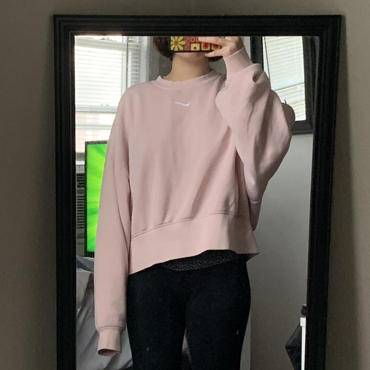 Light pink best sale nike sweatshirt