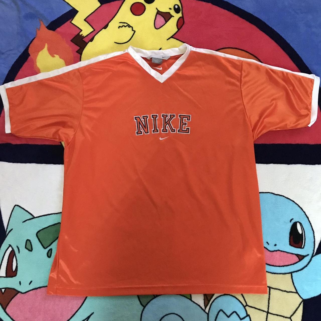 fluorescent orange nike shirt