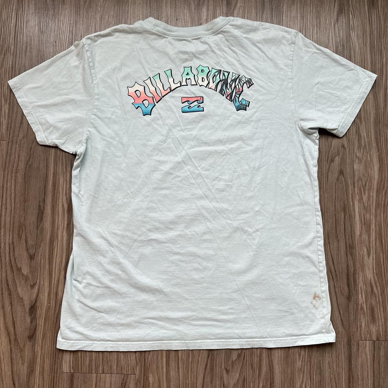 Billabong tshirt. Baby blue front and back graphic.... - Depop