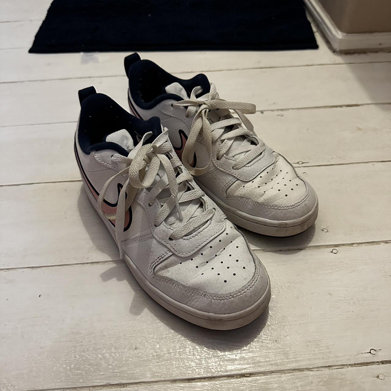 navy and white court shoes