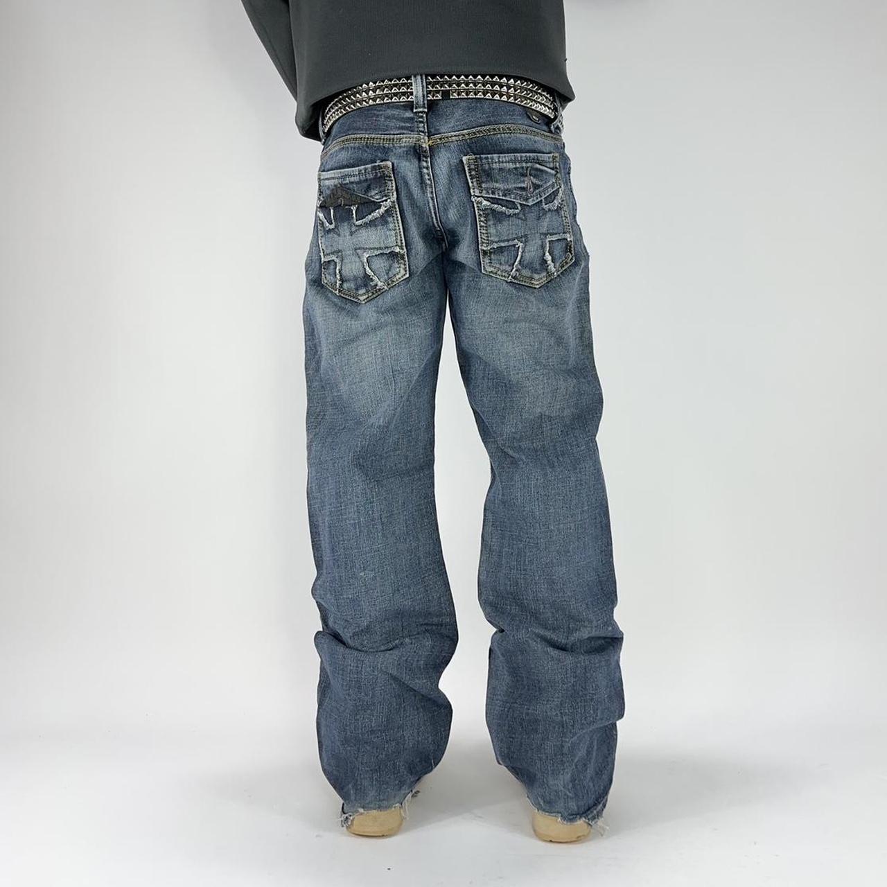 Helix Cross Embroidered Relaxed Bootcut Jean Pants... Depop