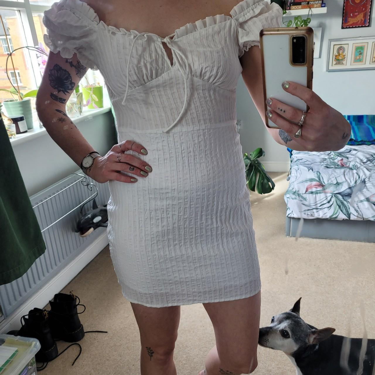 White mini dress with tie front. Has cute off-the... - Depop
