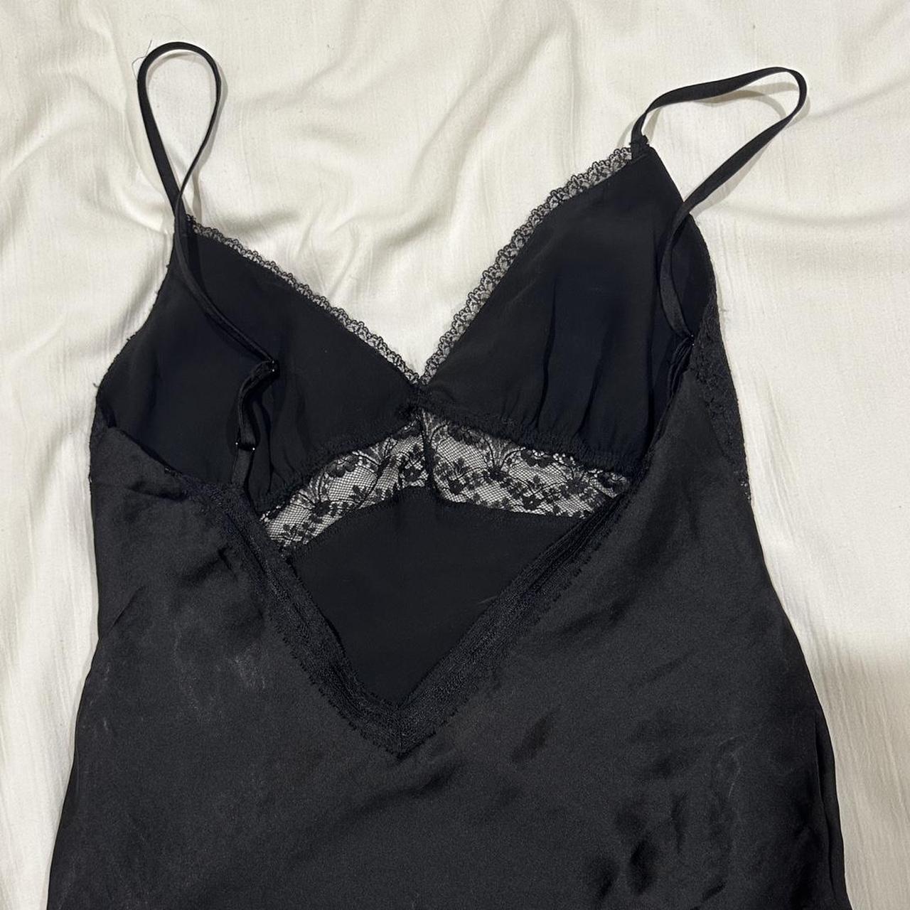 the cutest black lace cami 🖤 has a backless v cut Depop