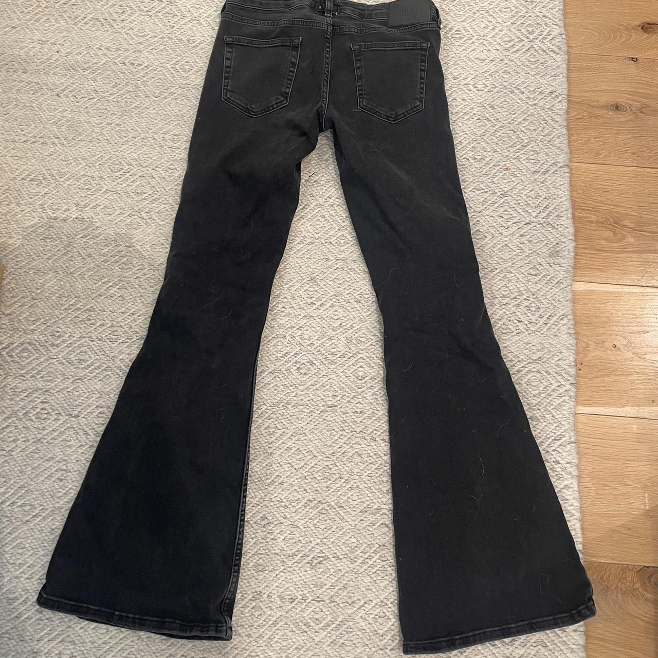 Black BDG lowrise flare jeans the waist measurement... - Depop