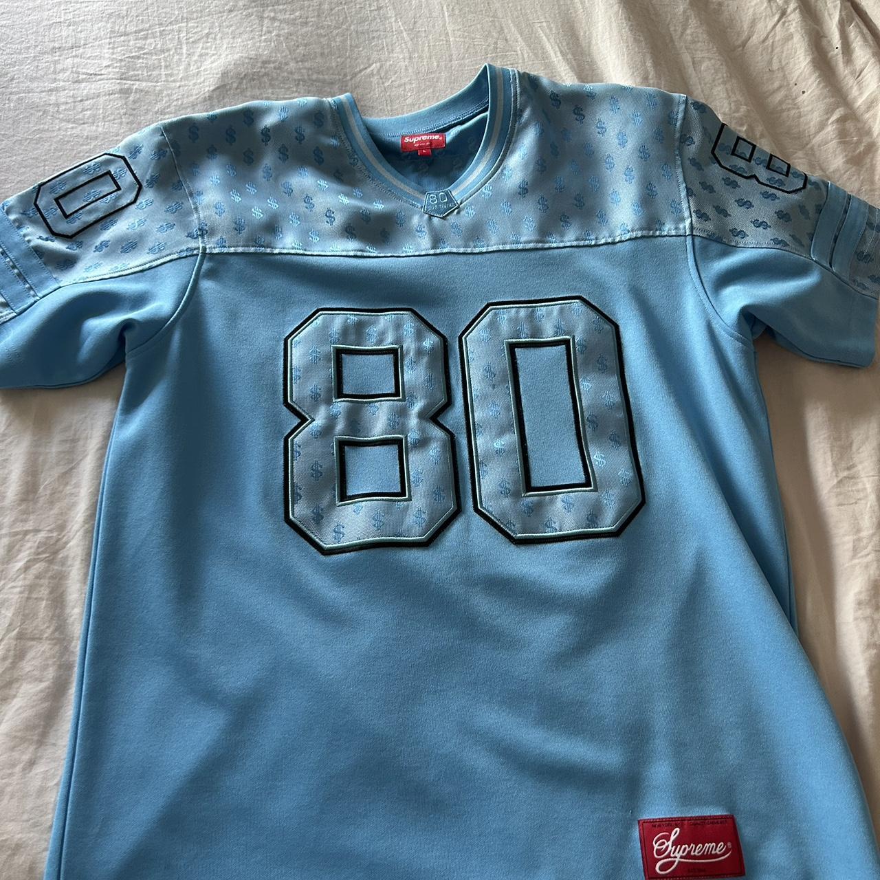 Supreme jersey with money sign detailing and...