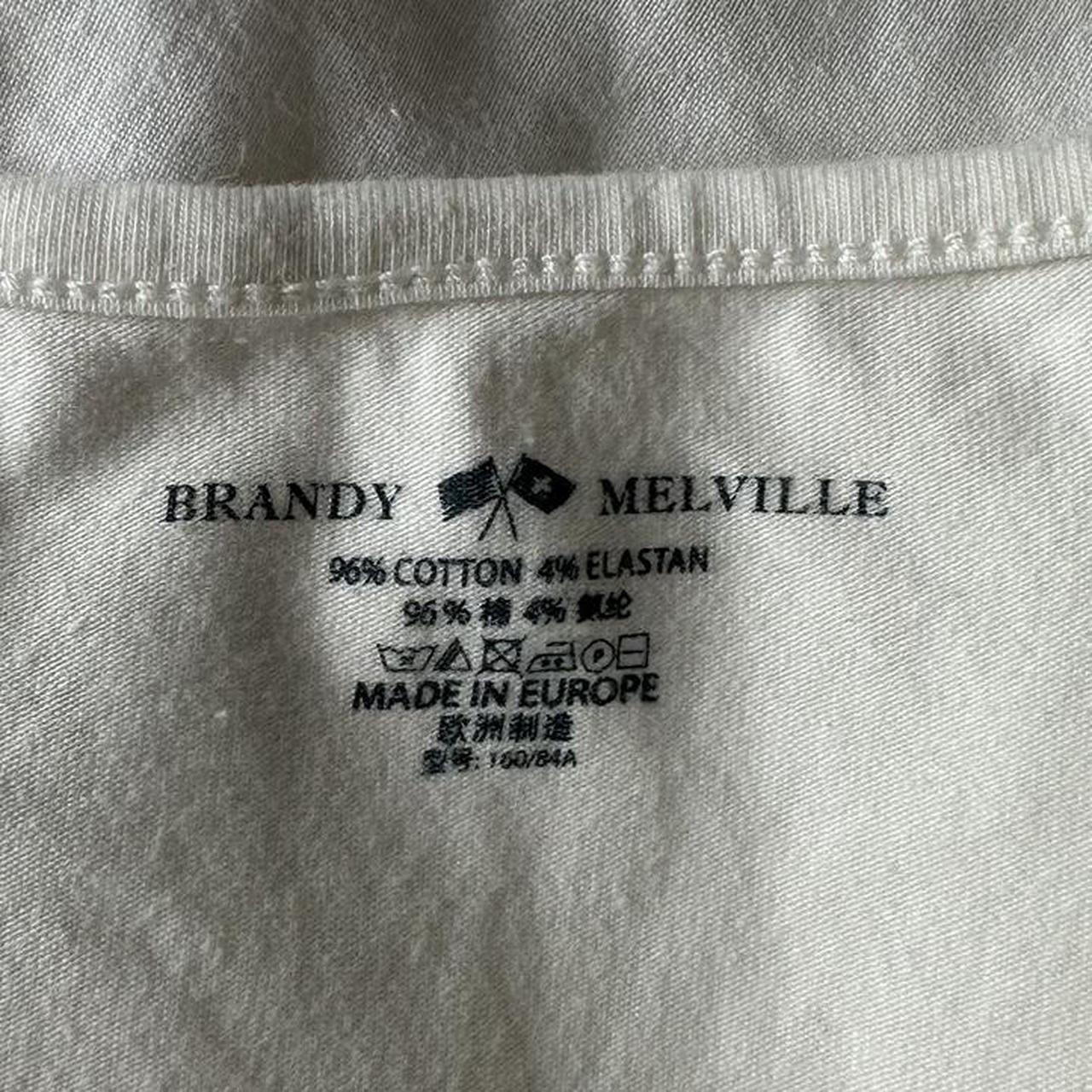 Brandy Melville white button up top. Only worn a few... - Depop