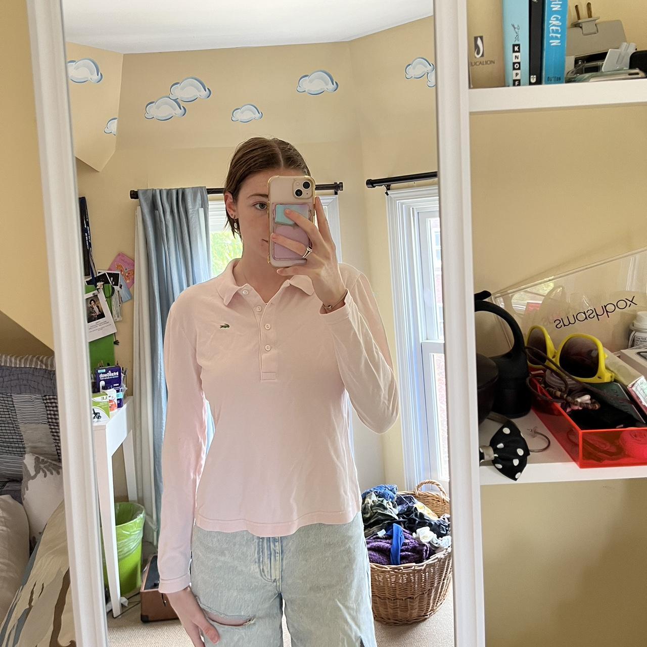 super cute baby pink lacoste polo no size given, but... Depop