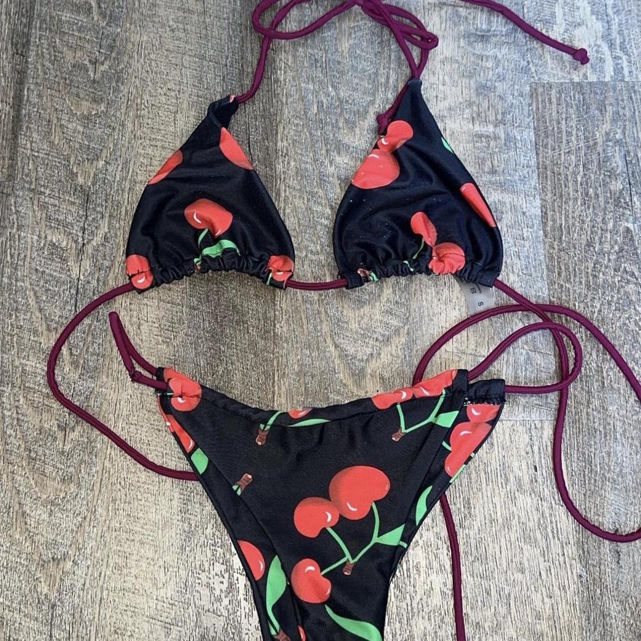 Small cherry bathing suit.. worn once - Depop