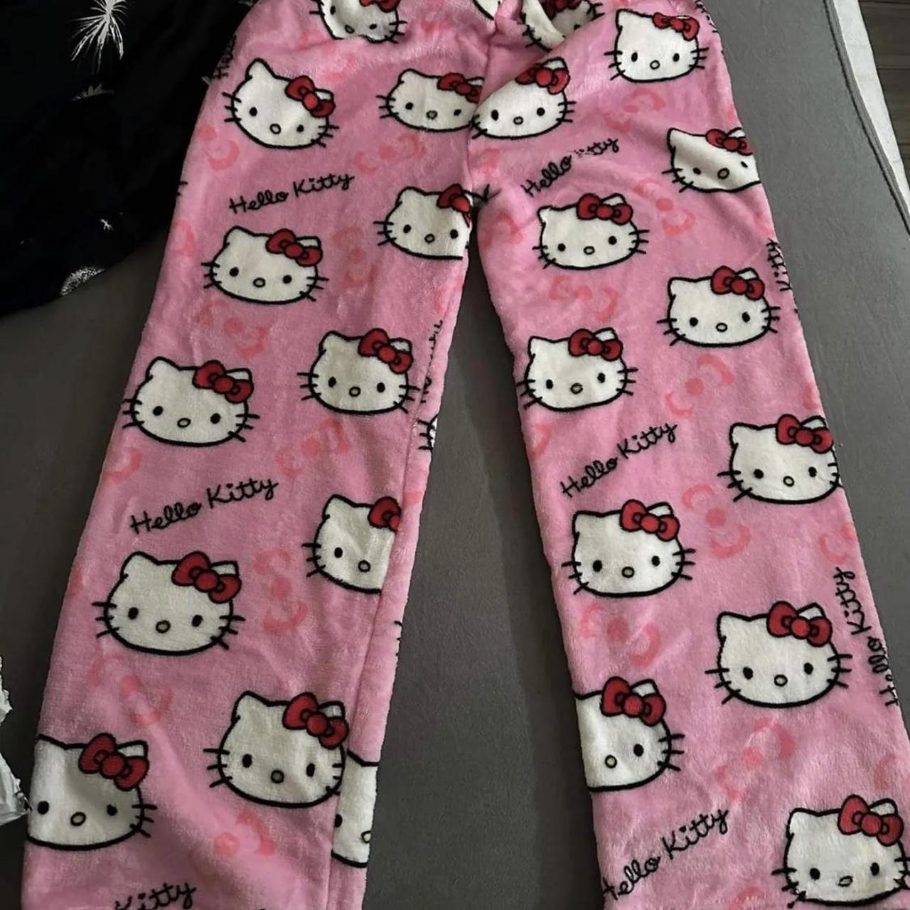 black and pink hello kitty sweatpants! selling as... - Depop