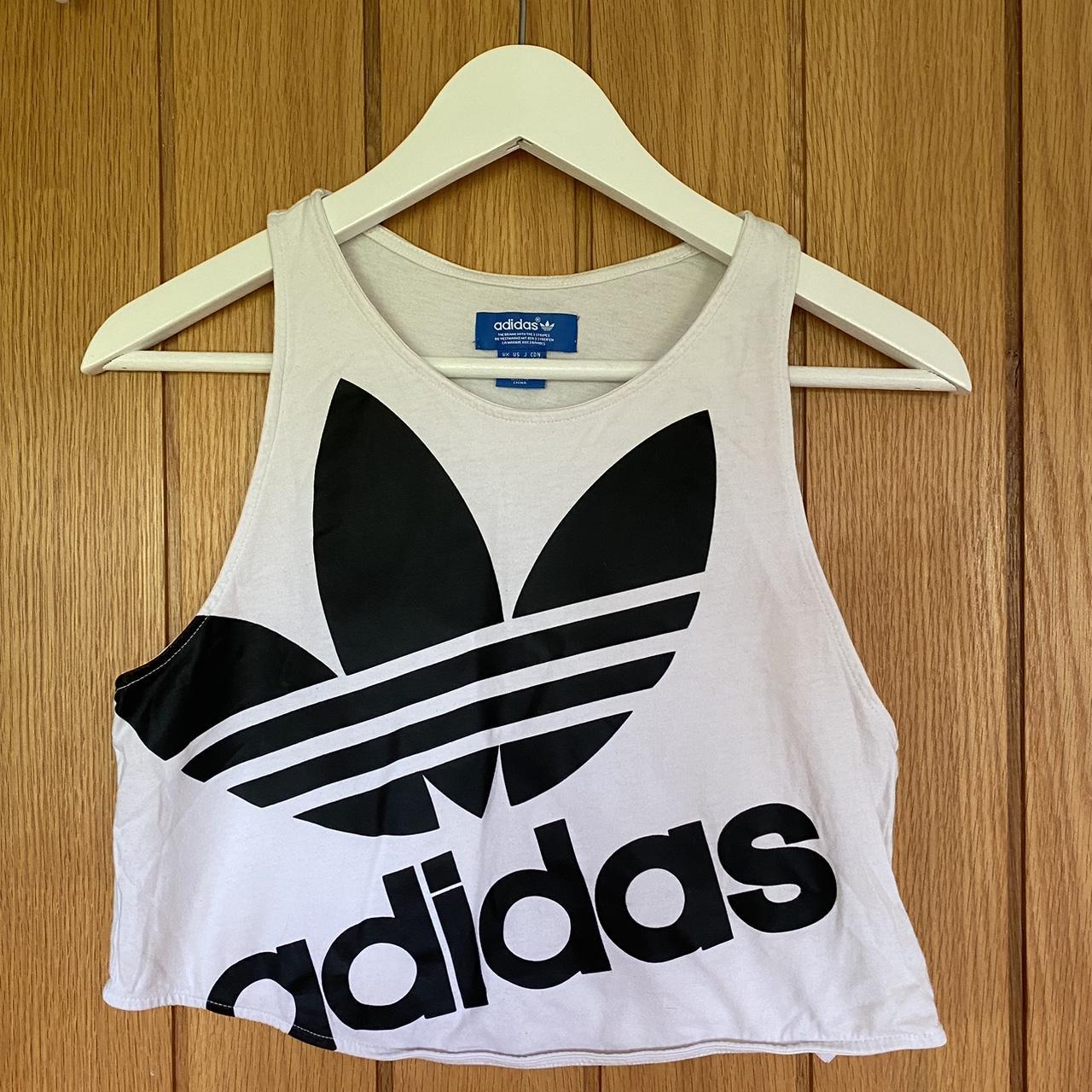 White adidas crop top with black lettering. Size... Depop