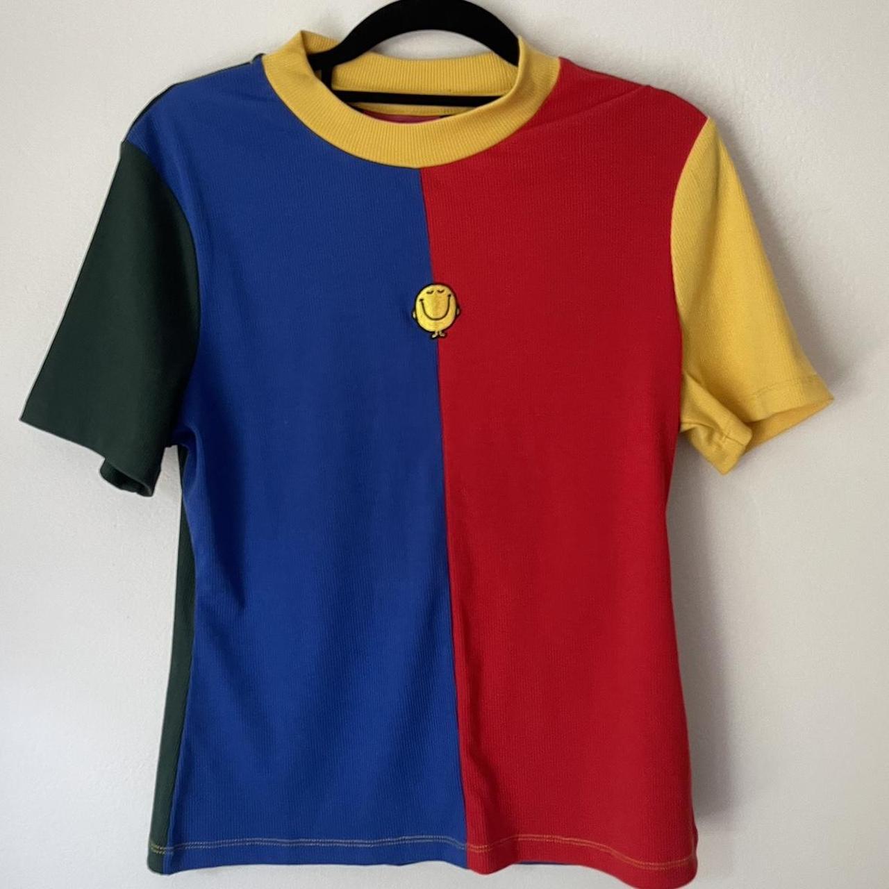 red green blue and yellow shirt