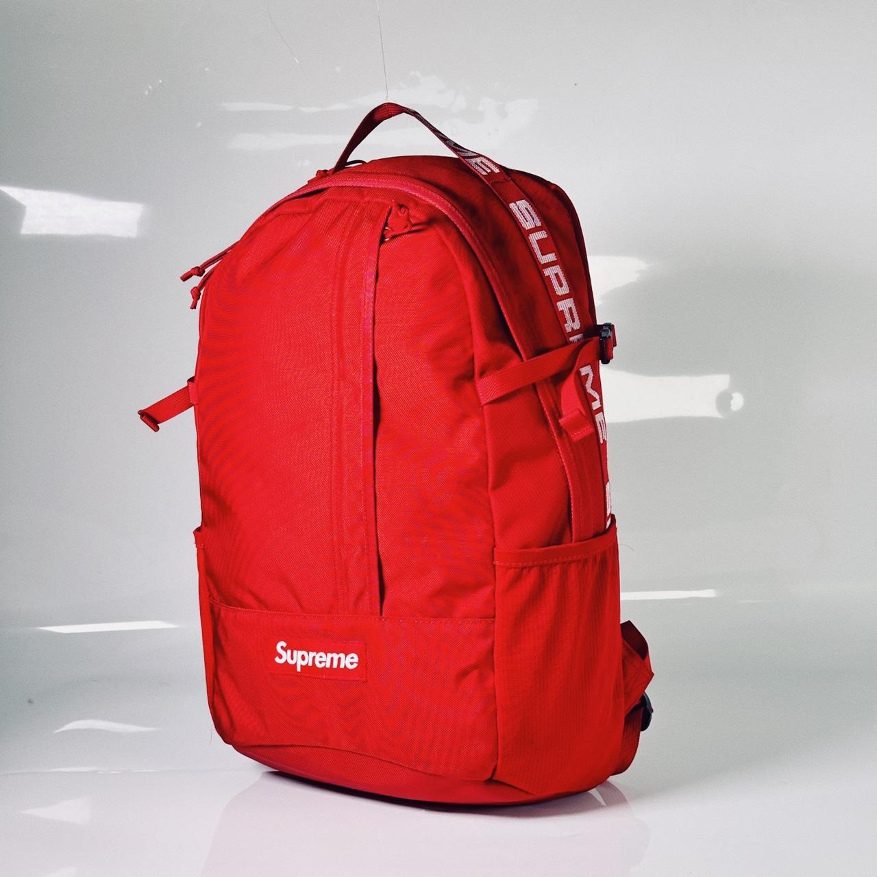 All red supreme backpack online