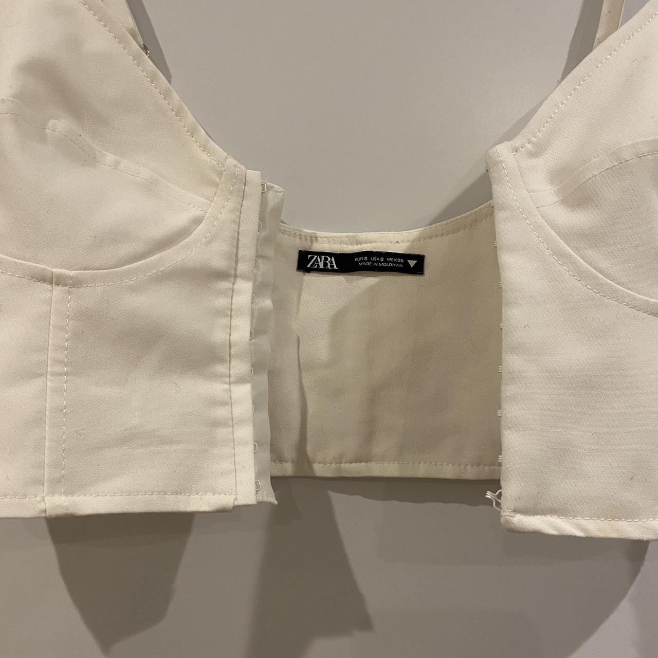 White Zara cropped corset with hook and eye front.... Depop