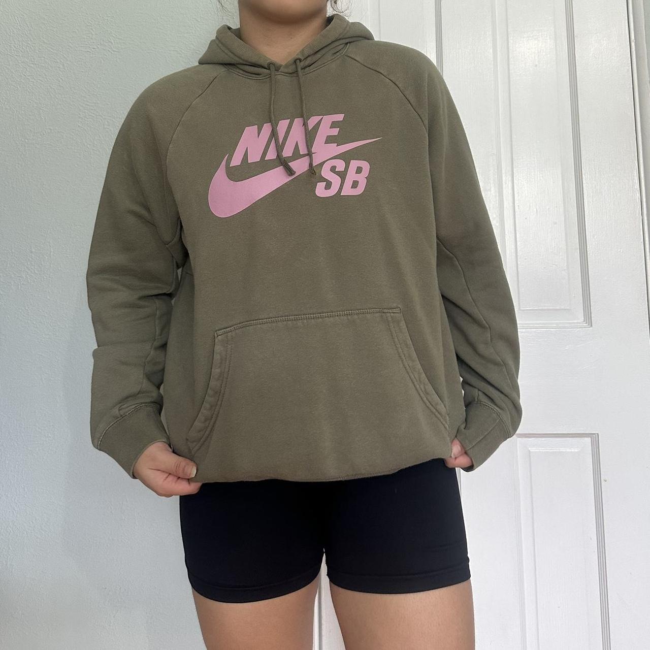 cozy sage green nike hoodie with pink writing by Depop