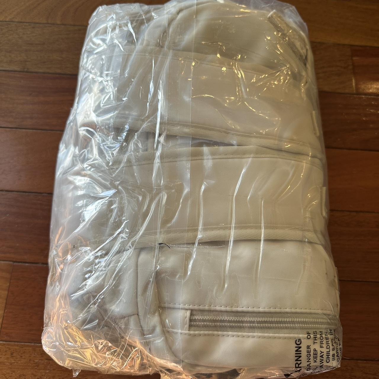 White/Beige TSA approved carry on backpack from... - Depop