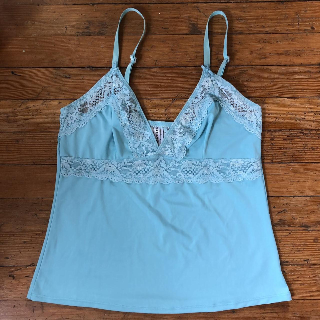 Little baby blue cami with strips of lace. Super... - Depop