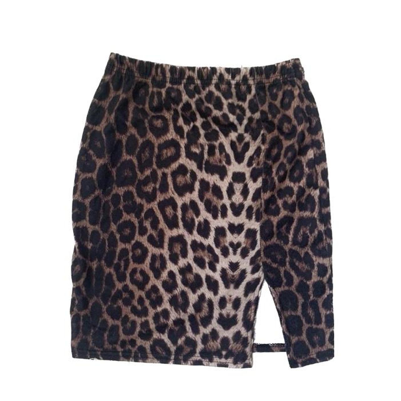 Leopard print mini skirt with elastic waist and side... - Depop