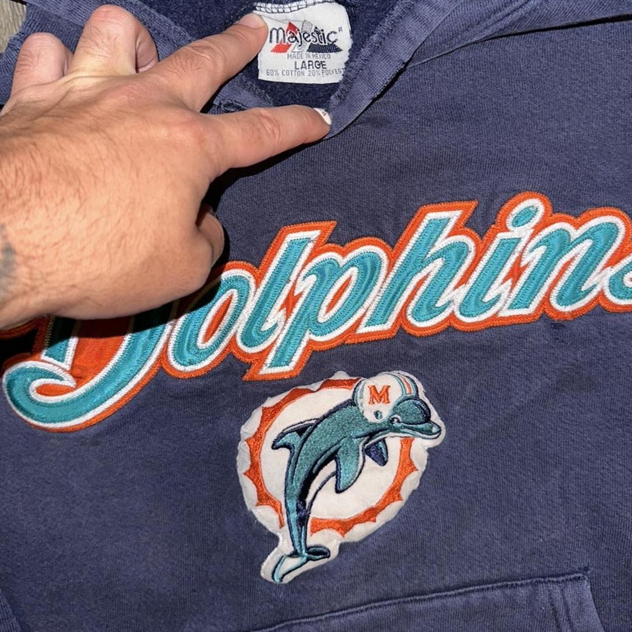 Vintage Miami dolphins hoodie . Nice faded blue - Depop