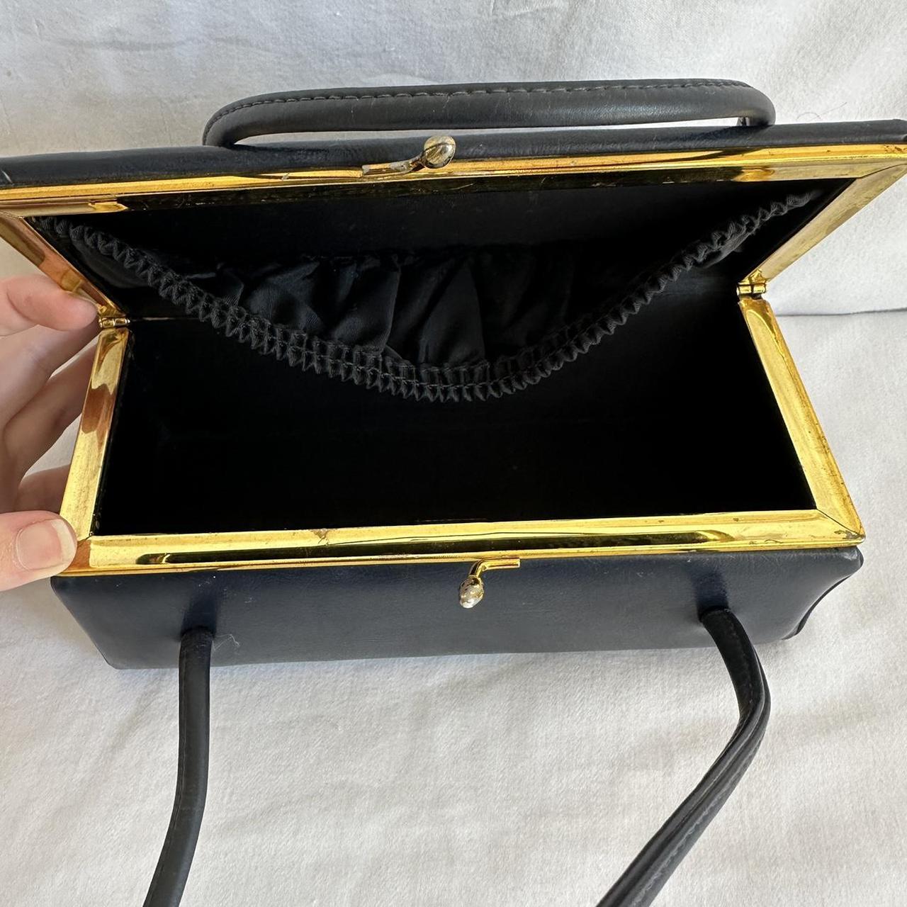 Vintage black box handbag some wear on the clasp... - Depop