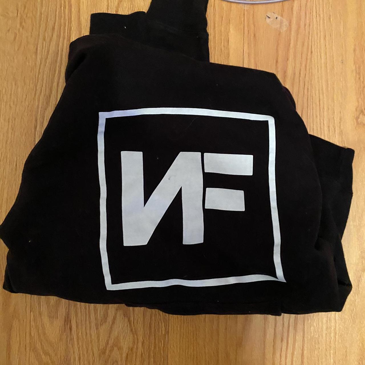 NF black hoodie worn once or twice authentic merch... - Depop