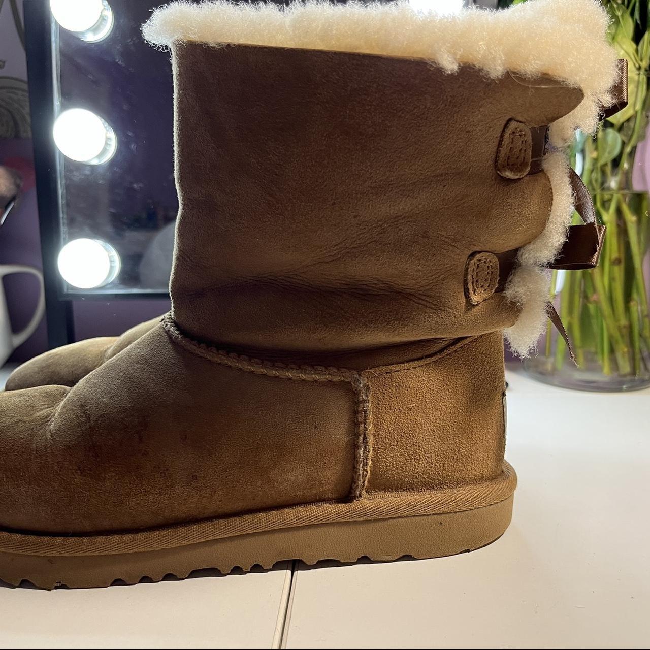 Brown Bailey bow Uggs Little bit of water damage... Depop