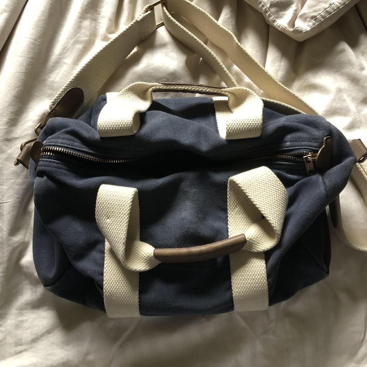 Brandy Melville navy blue duffel bag 13” long and... Depop