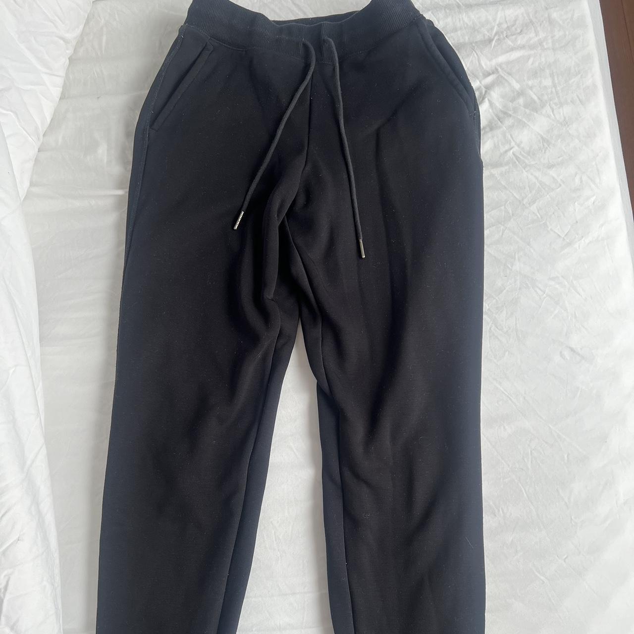 Uniqlo black tracksuit pants Fleece lined Perfect... - Depop