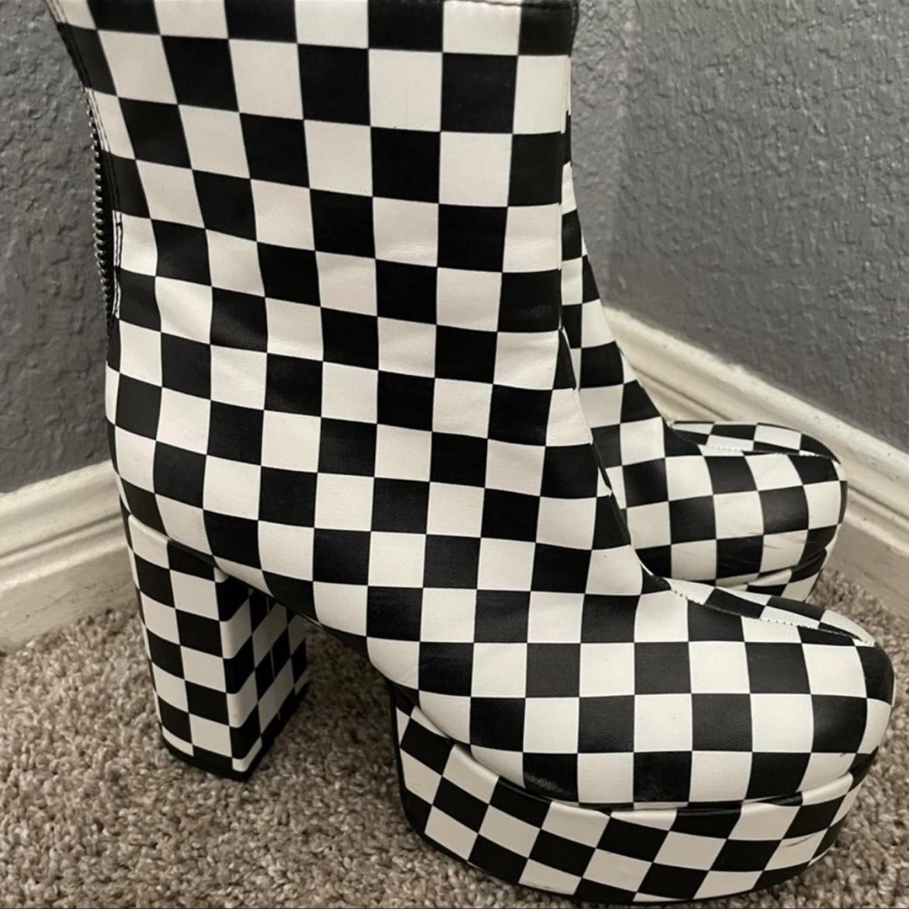 Dolls Kill Women's White and Black Boots Depop