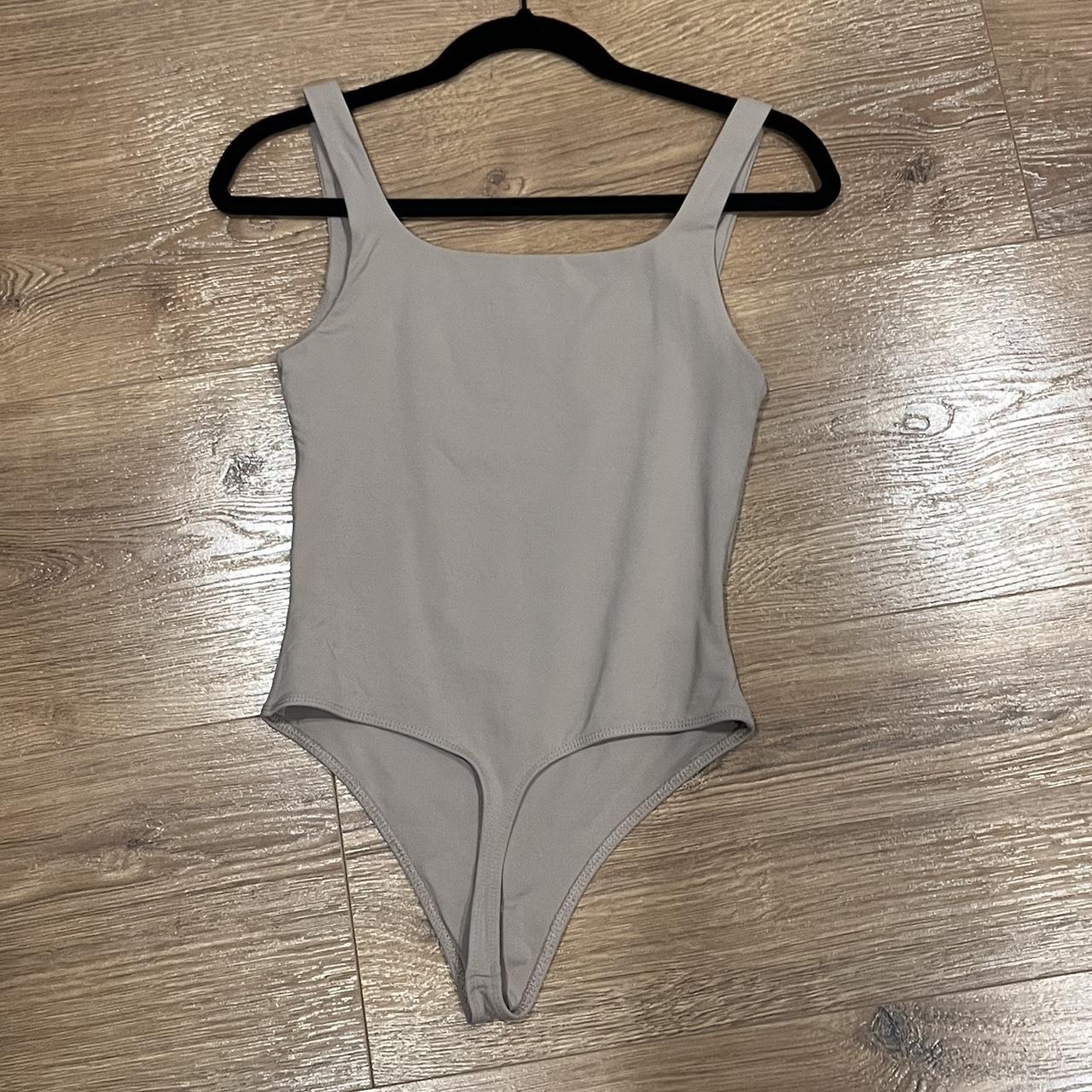 Aritzia nude body suit size M - Depop