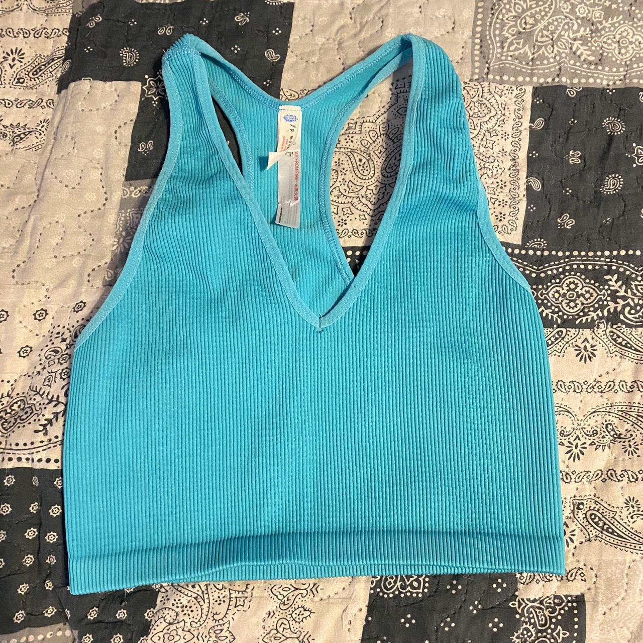 Free people movement top 
Size - L 
Color-...