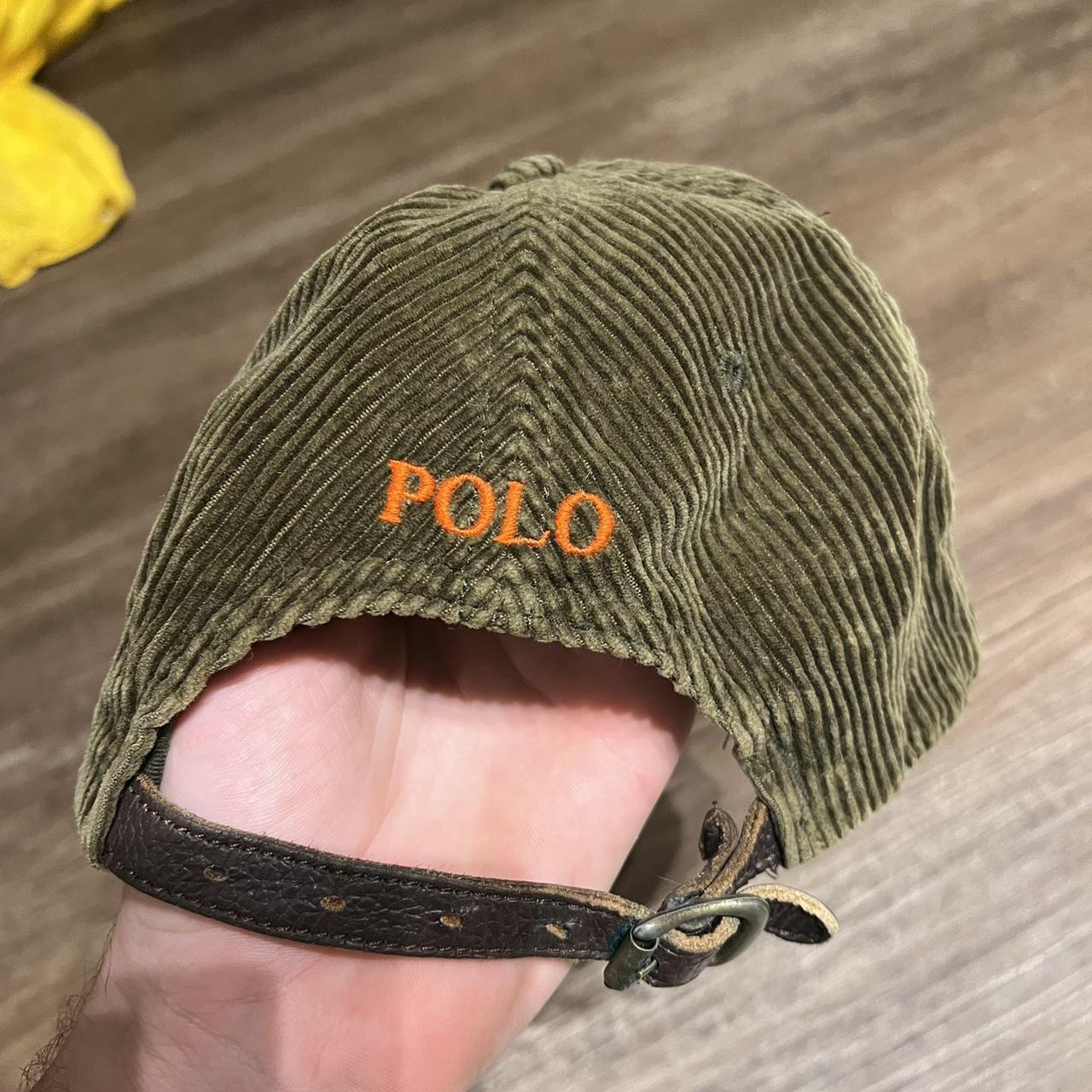 green and orange polo hat