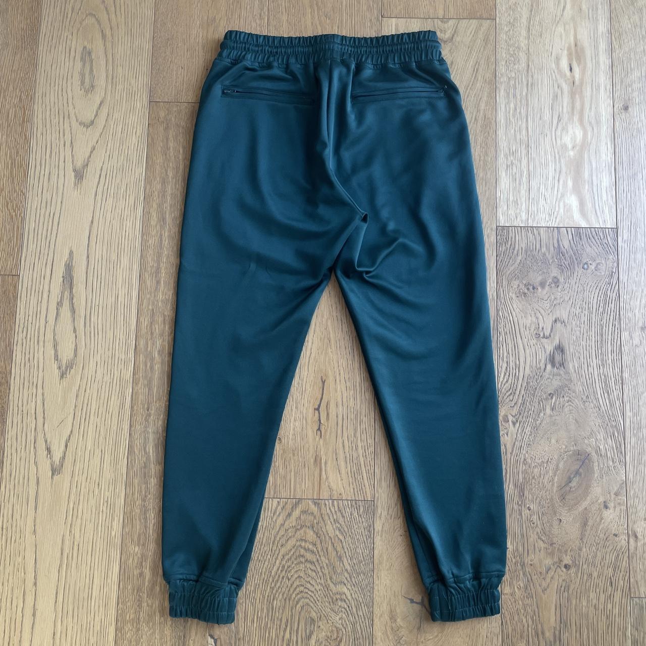 Daily Paper forest green and red joggers with... - Depop