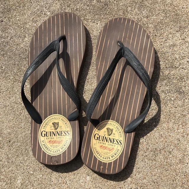 Guinness flip flops store with bottle opener