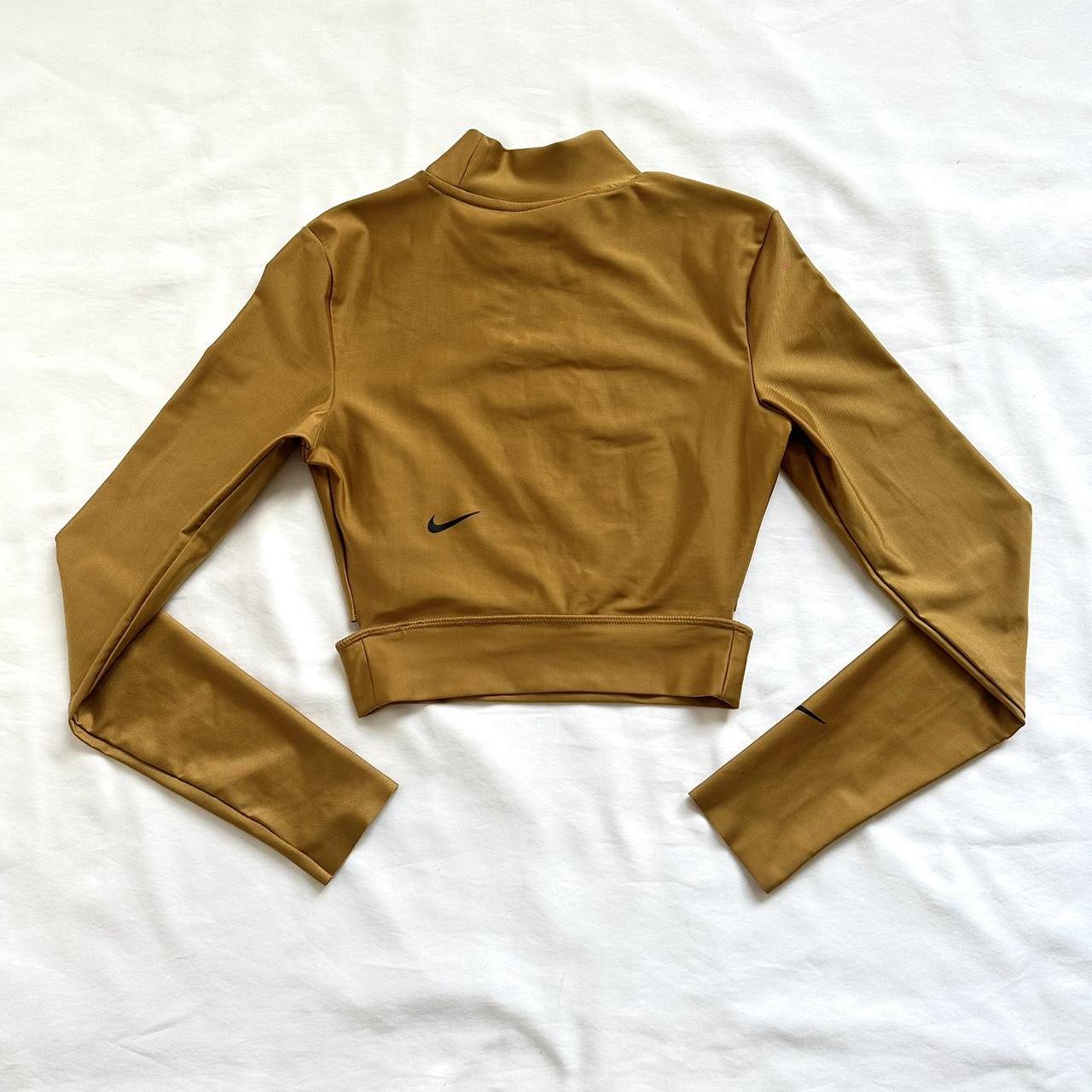 nike gold crop top