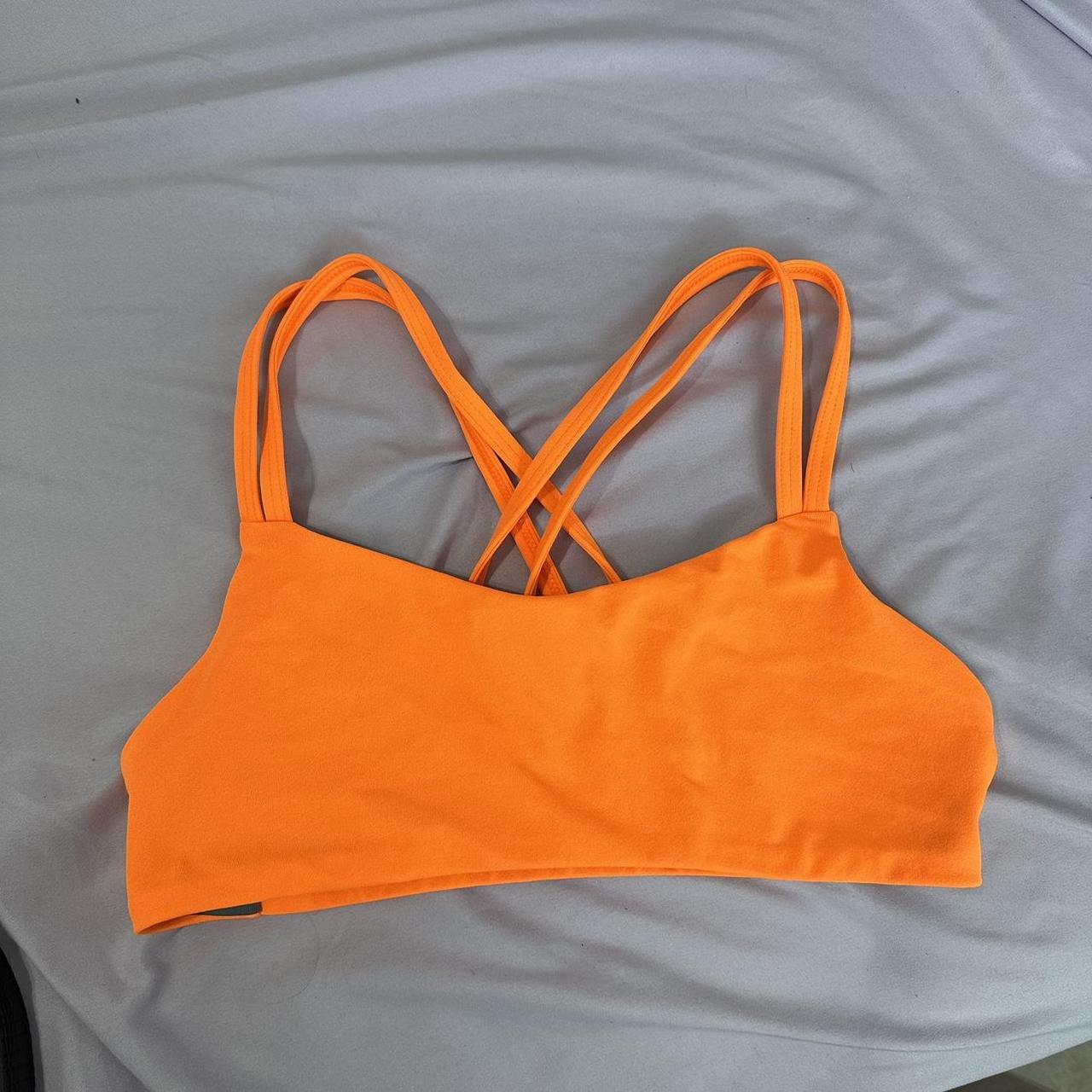 neon orange jolyn sports bra small - Depop