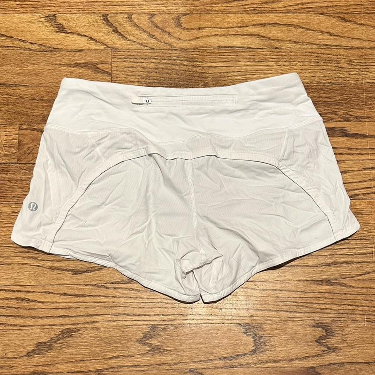 White Lululemon shorts, very faint stain pictured in... - Depop