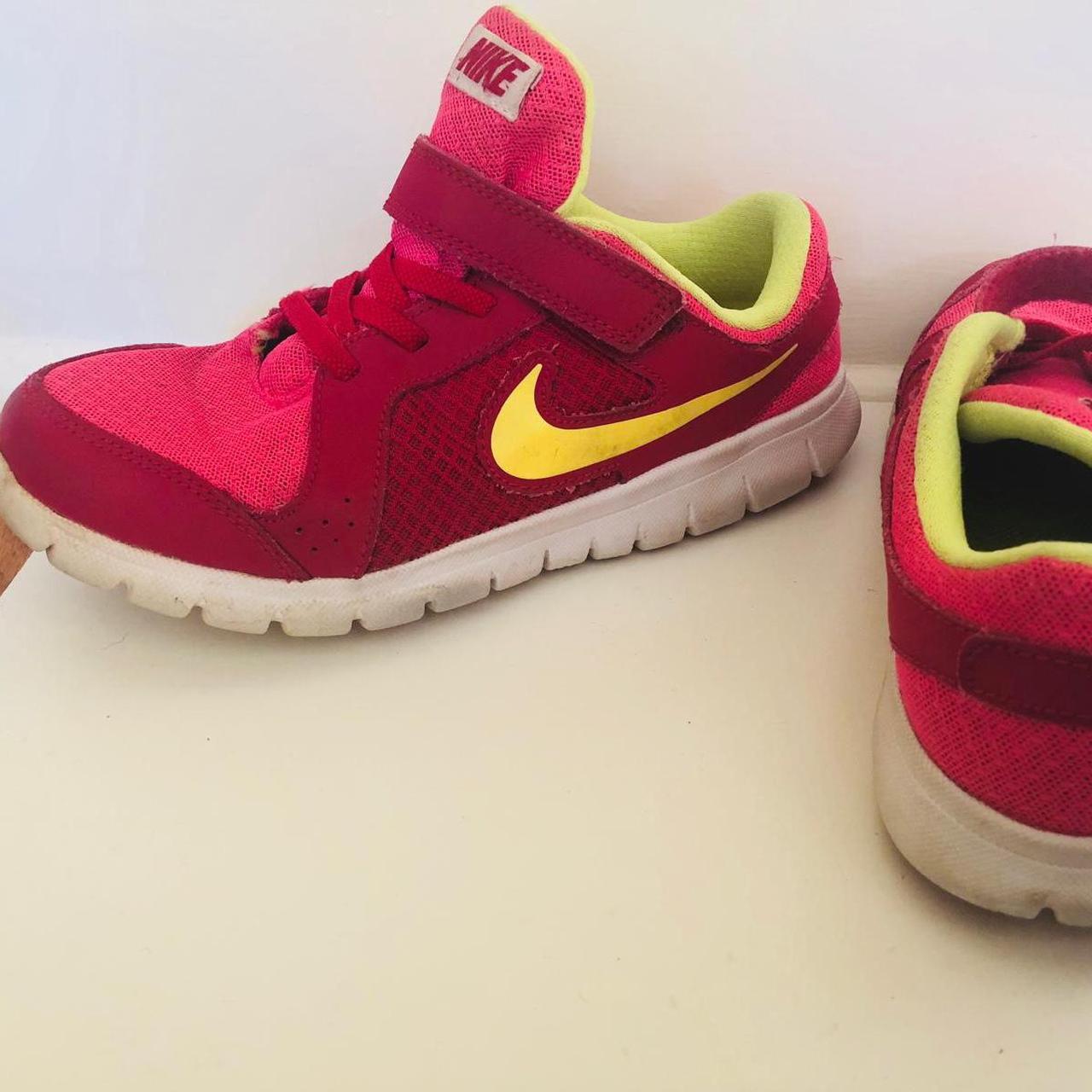 Pink and lime green nike shoes deals