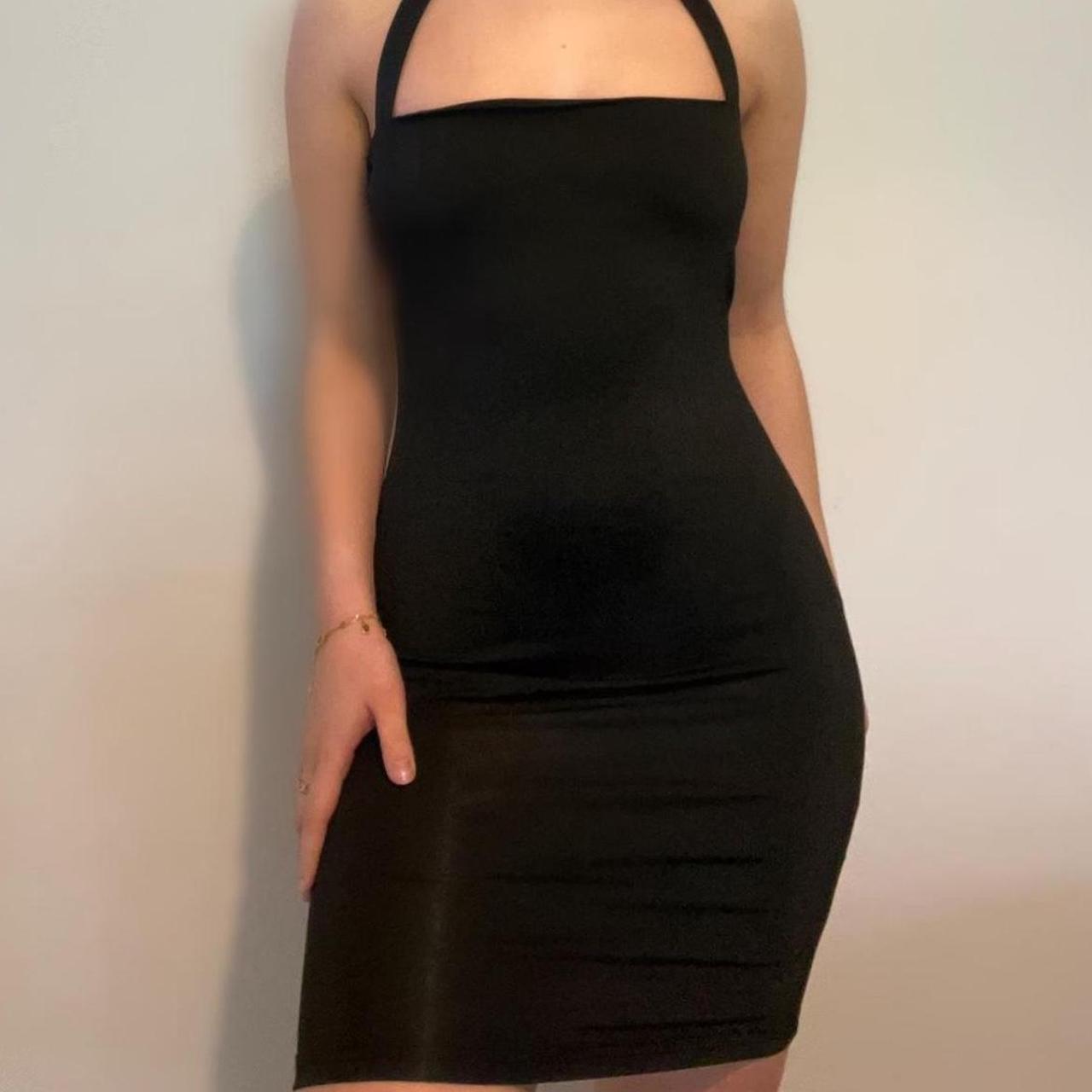 Black halter-neck midi dress. Super sexy black... - Depop