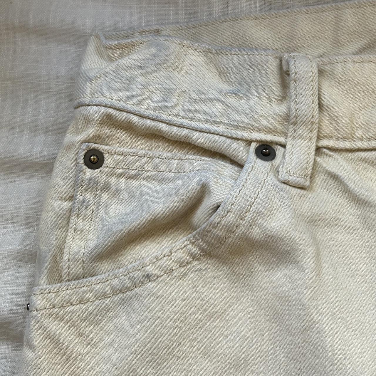 uniqlo cream pants slight color stain on waist line - Depop