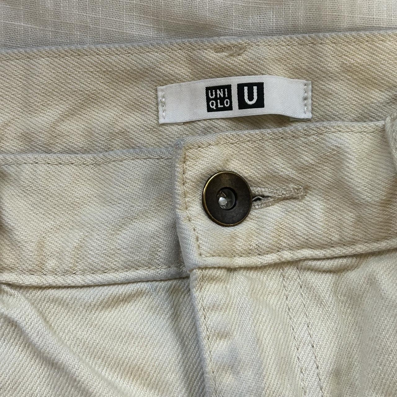 uniqlo cream pants slight color stain on waist line Depop