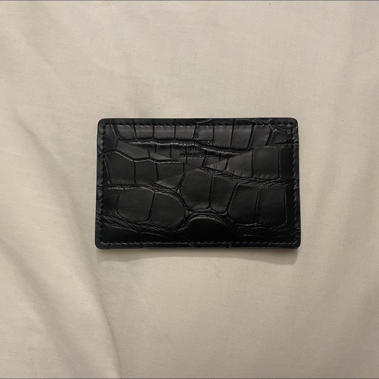 Brand new Louis Vuitton black alligator card holder.