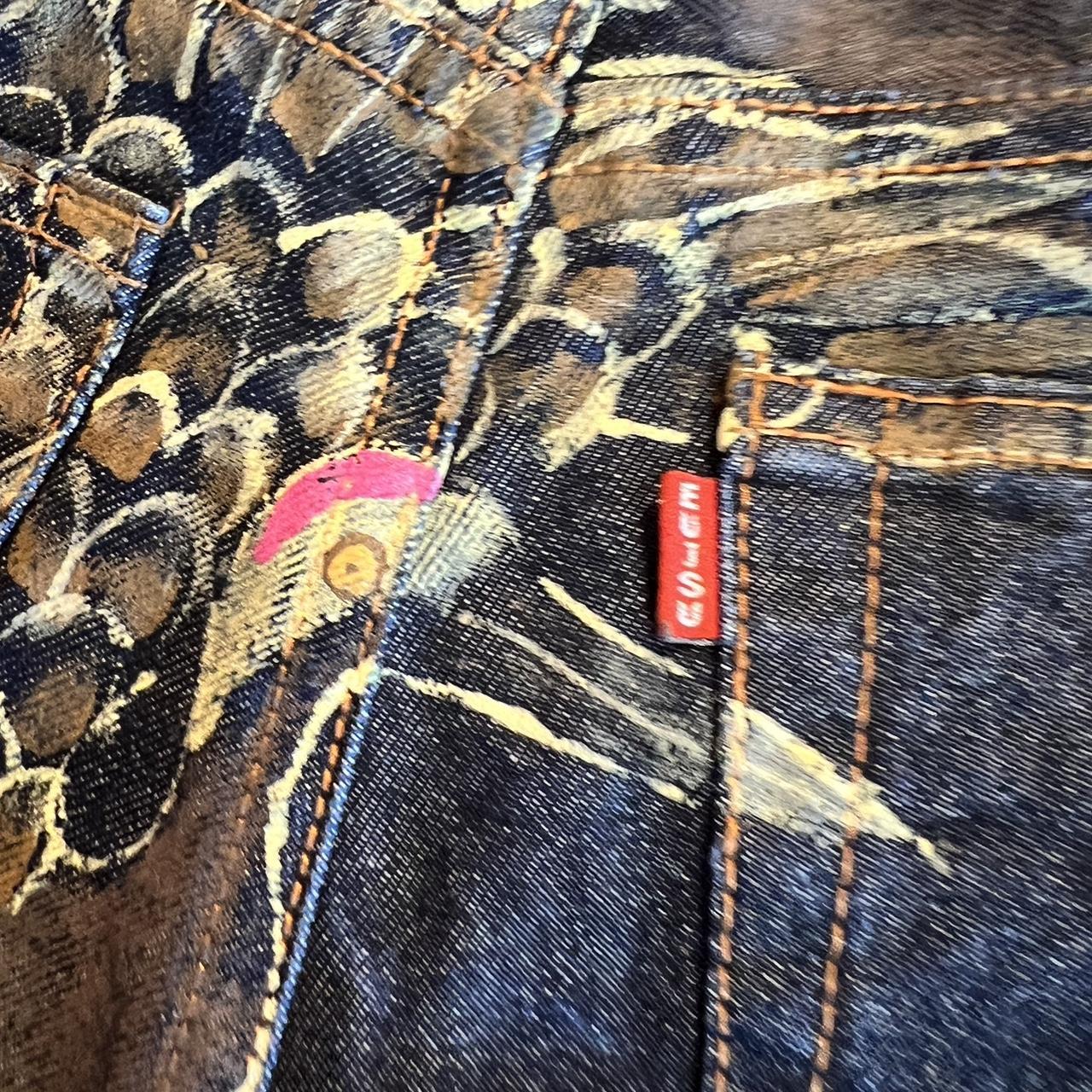 Evisu Painted Bird jeans. One of the belt loops is... - Depop