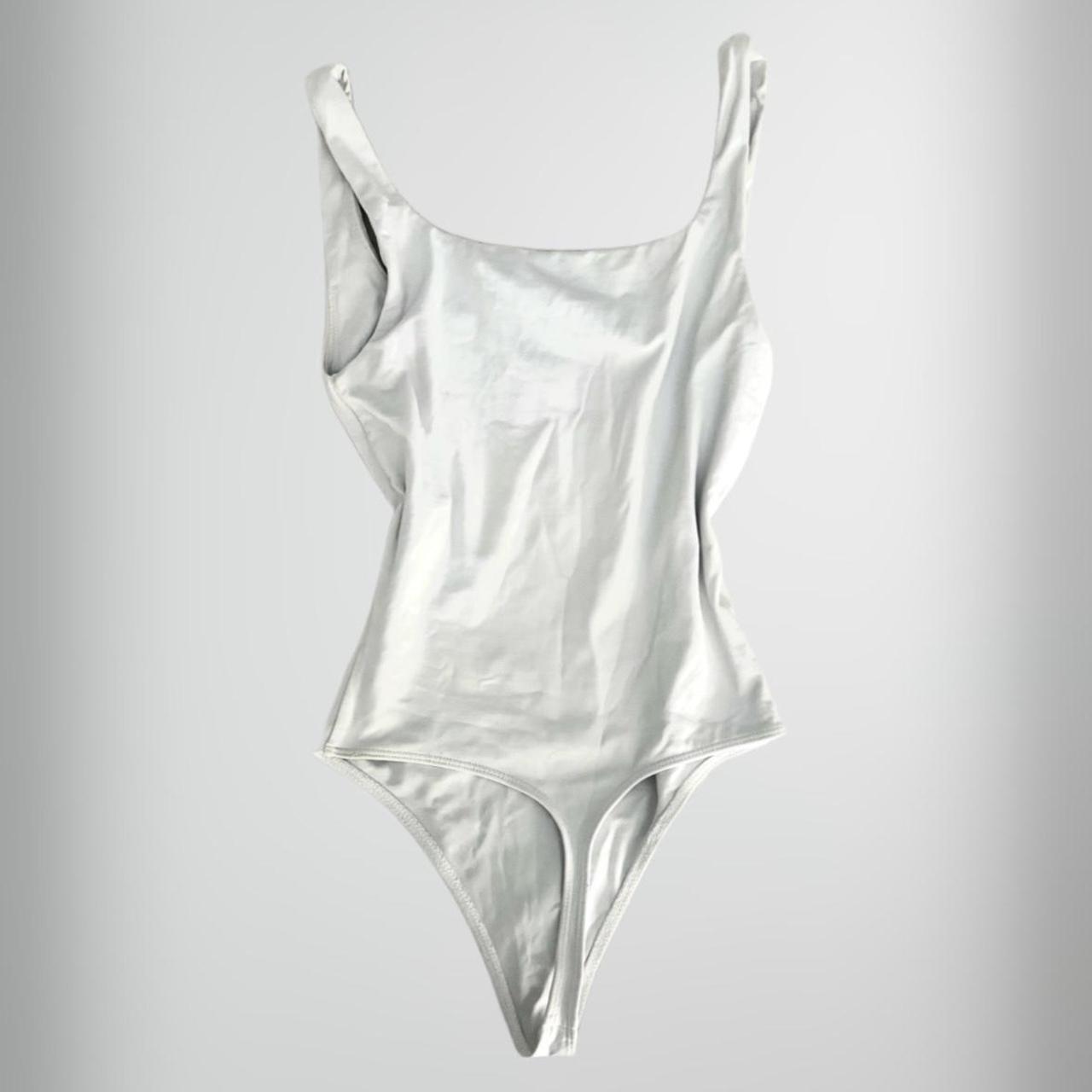 Aritzia bodysuit. babaton contour bodysuit. White - Depop