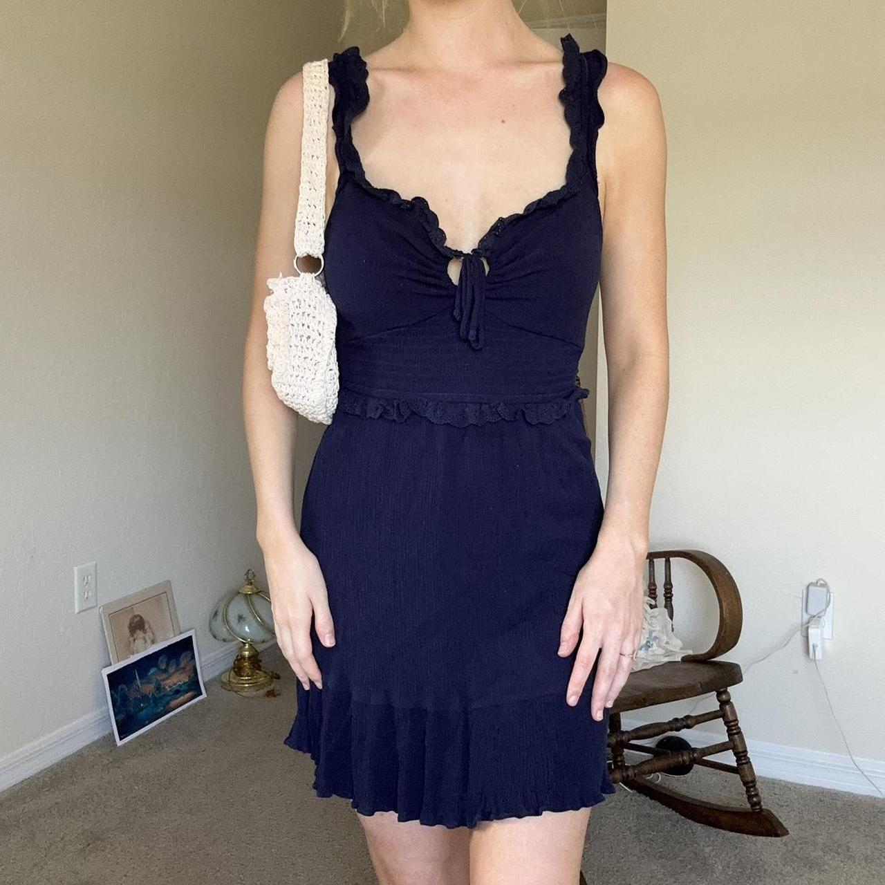 Milkmaid ruffle smocked tie mini dress Has a rip and... - Depop