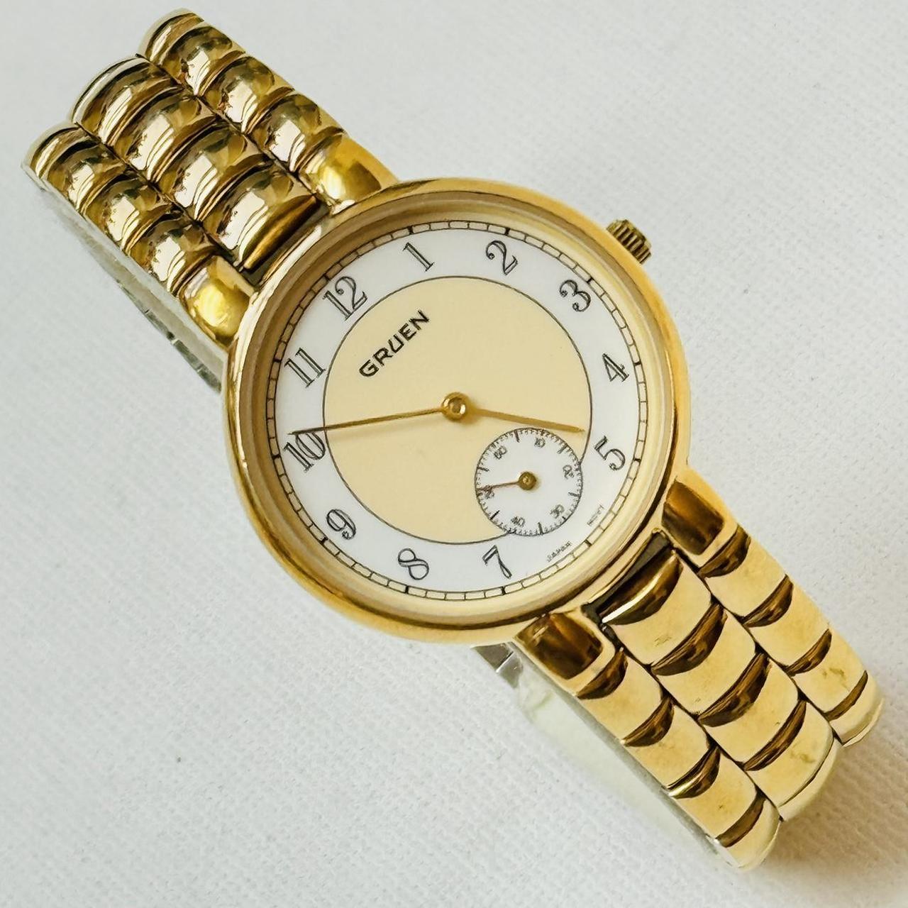 Gruen women's gold outlet watch