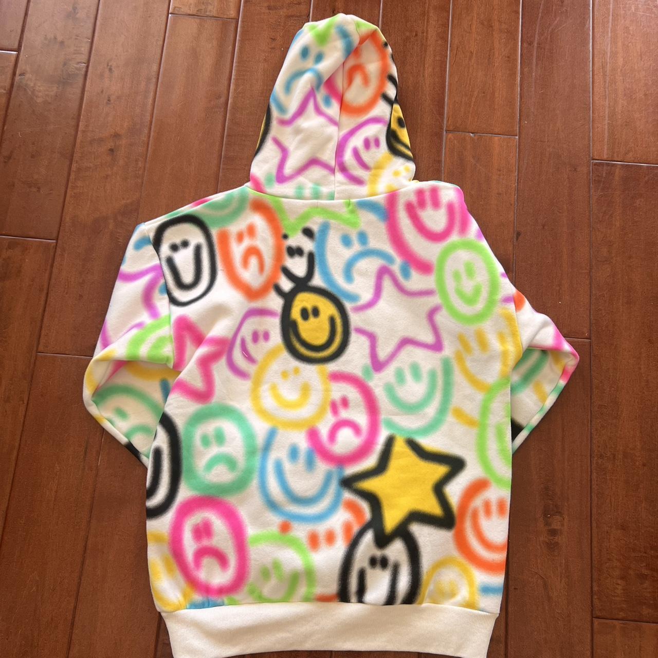 Pacsun small colorful spray paint hoodie. Never worn... Depop