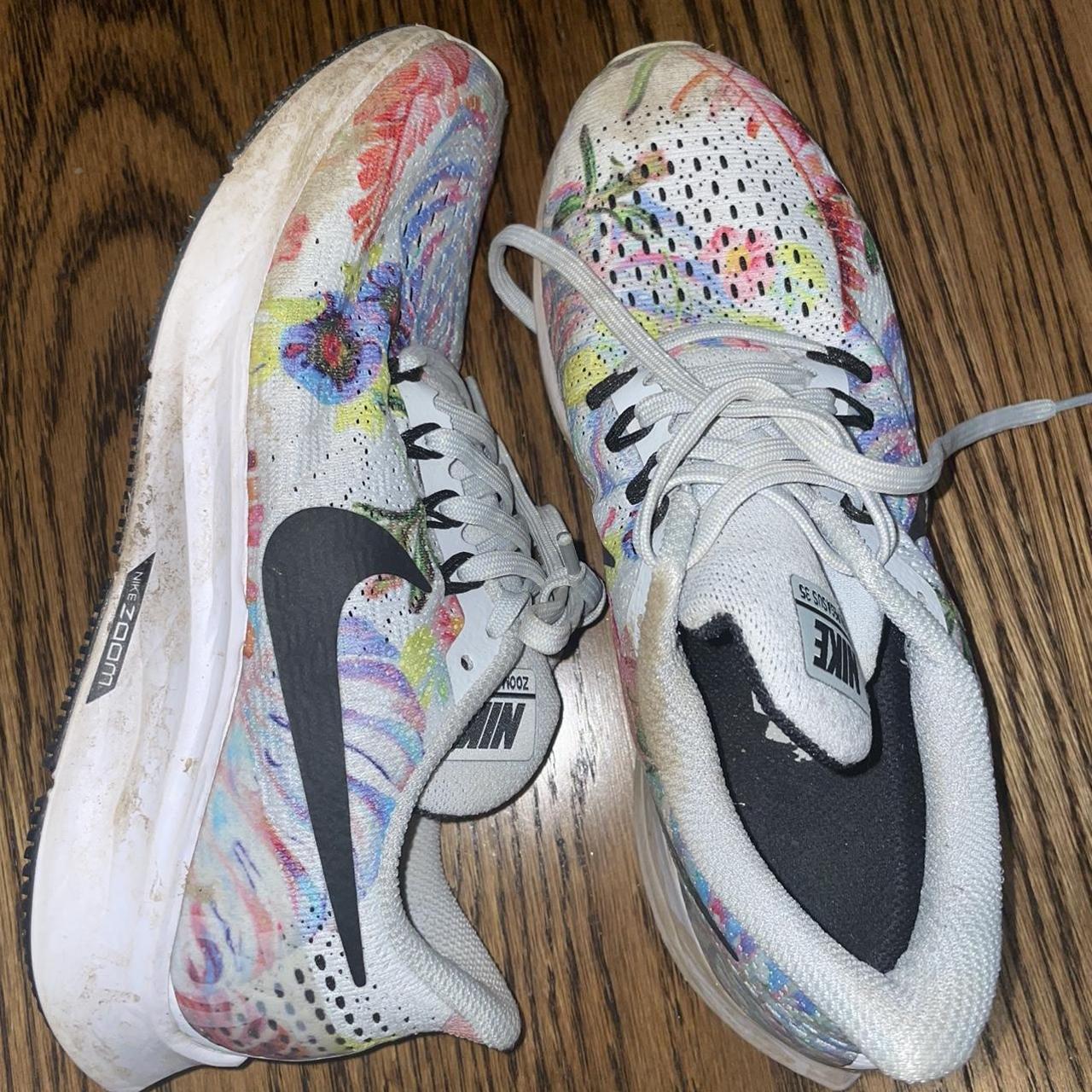 multi colour nike trainers
