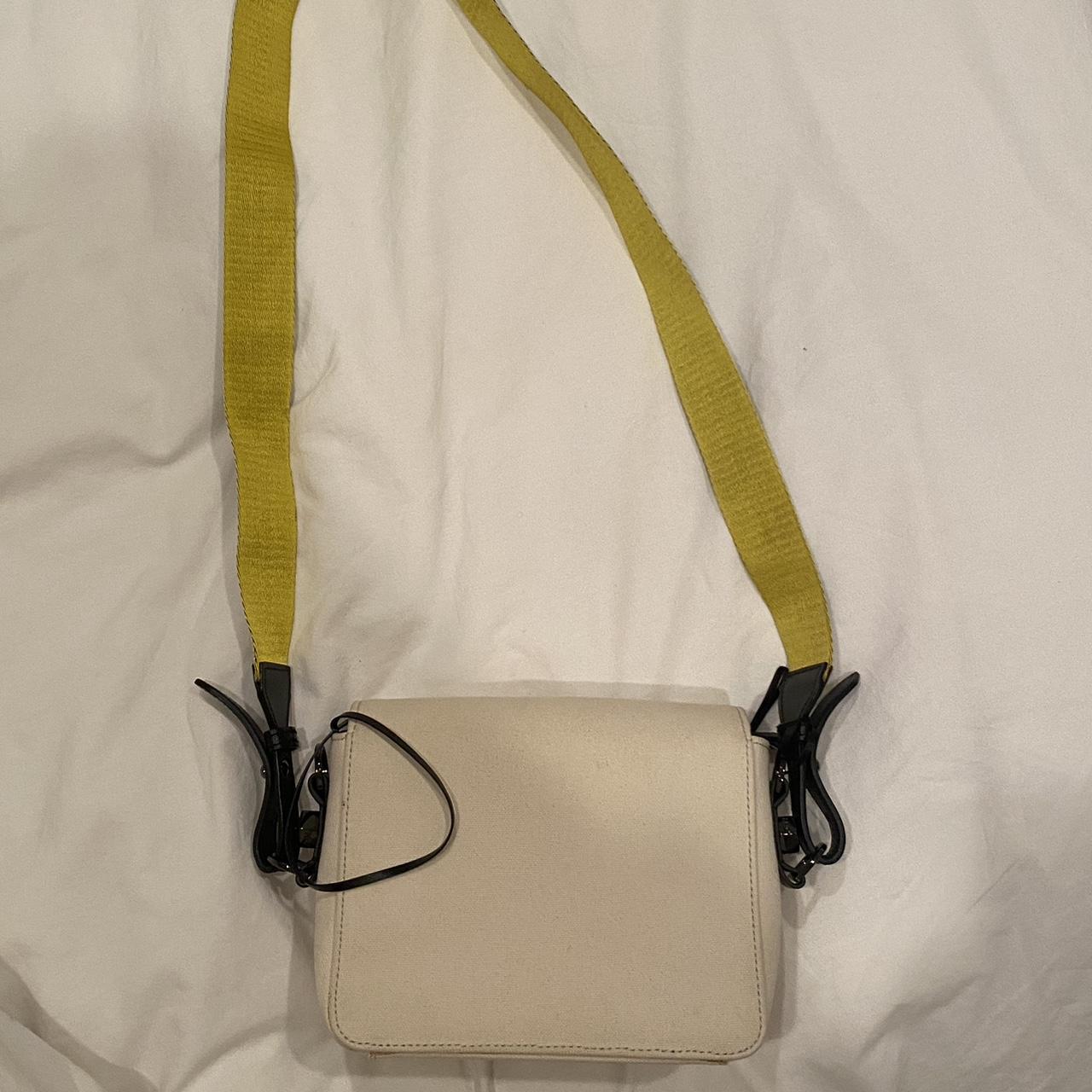 Off white sculpture binder clip bag originally