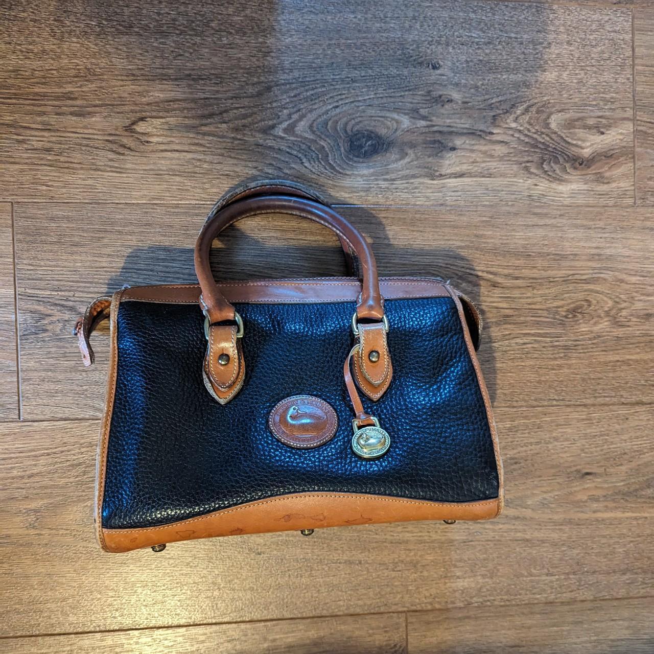 How can i tell if my dooney and bourke purse is real hot sale